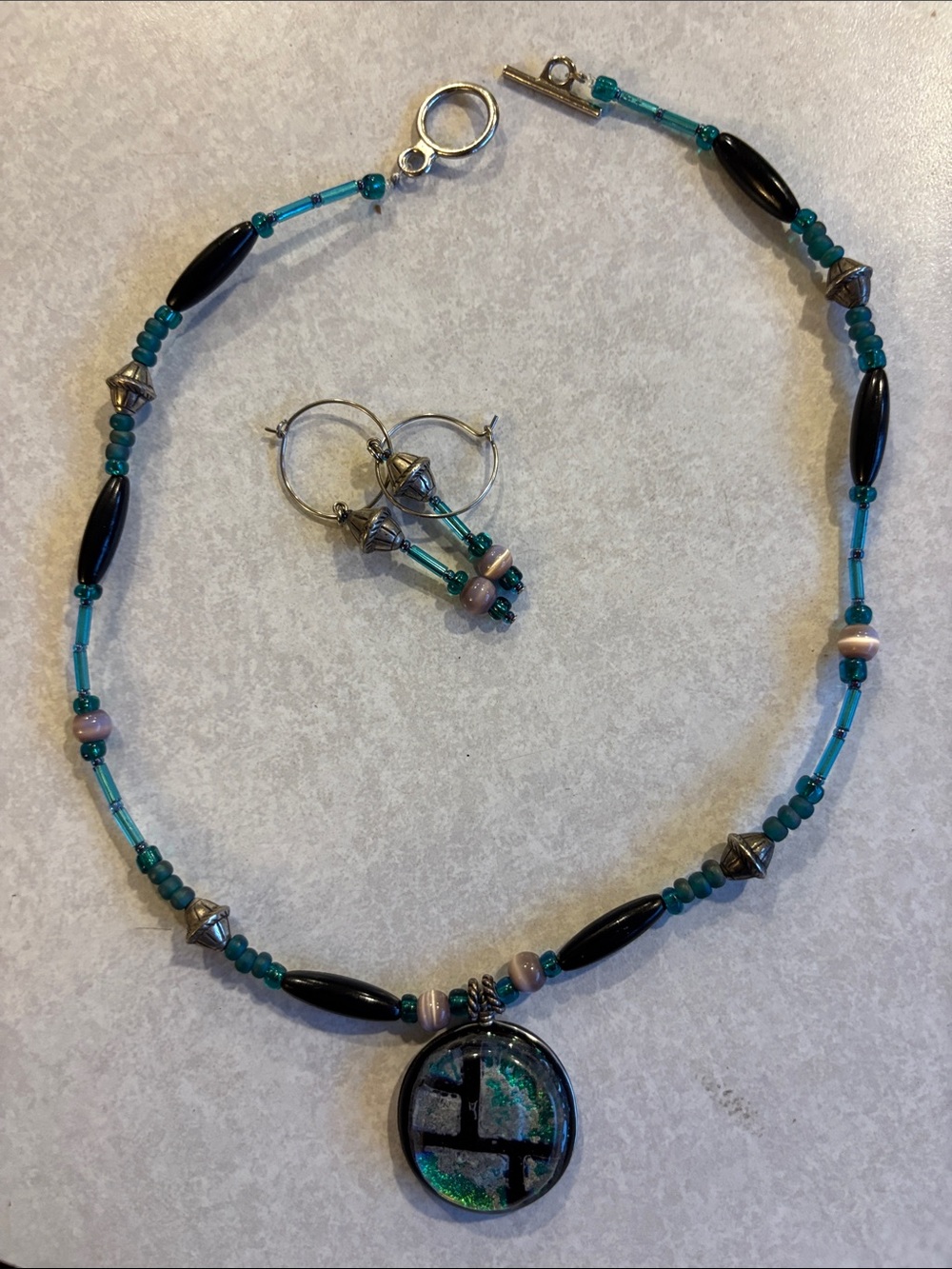 New- Teal Glass Pendant Necklace - and matching earrings- bought in Venice.